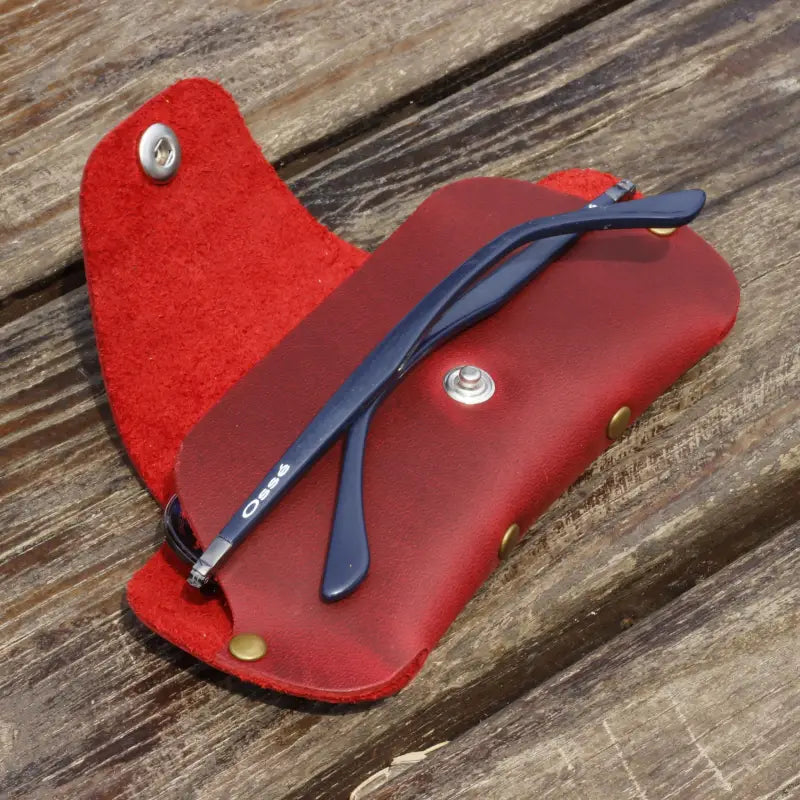 Red leather eyeglass case with blue glasses, stylish slim leather eyeglasses case for protection