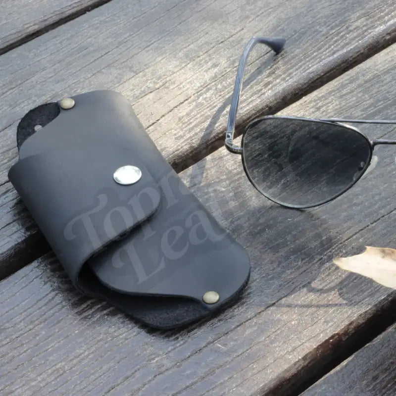 Black leather sunglasses case with aviator sunglasses, premium slim eyeglass case