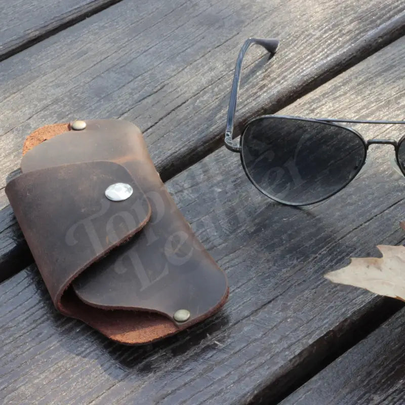 Brown leather sunglasses case with aviator sunglasses, stylish slim leather eyeglass case