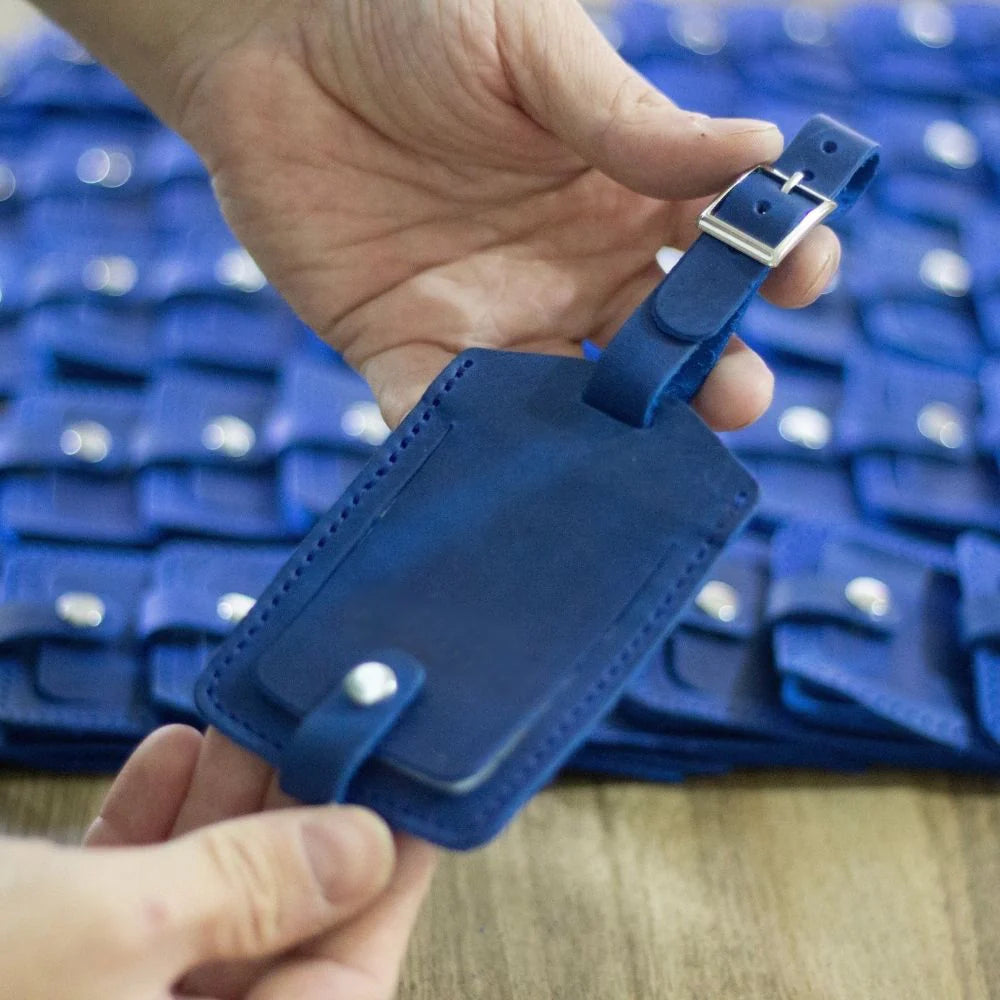 Blue leather luggage tag from the Ready to Ship Leather Accessories collection