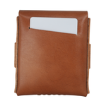 A brown leather card holder or wallet with a white card partially inserted into a front card slot, shown against a plain white background.  