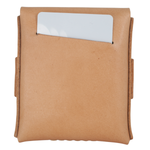 A tan leather card holder or wallet with a single card partially inserted into a top slot, shown against a plain white background. 