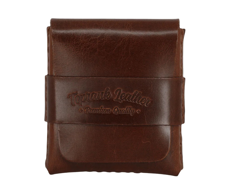 Slade Classic leather strap wallet in Dublin Tan, closed, with the strap embossed with the Toprank Leather Premium Quality stamp. 