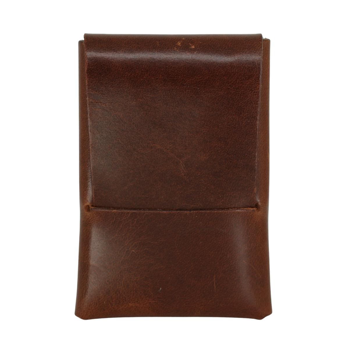 Flint Slim stitchless leather card holder in Dublin Tan with the front flap closed 