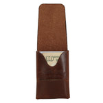 Flint Slim in Dublin Tan holding a folded bill, with embossed Toprank Leather logo 