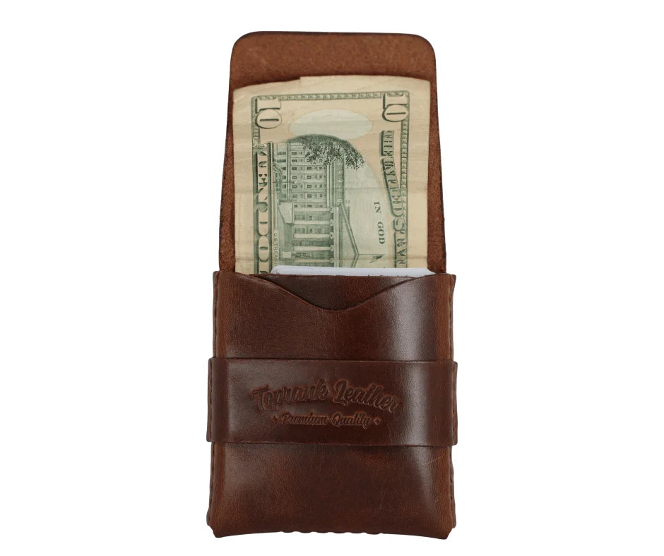 Slade Classic leather strap wallet in Dublin Tan, detail view on a white background. 