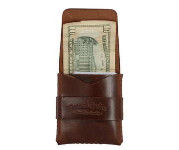 Slade Classic leather strap wallet in Dublin Tan, detail view on a white background. 