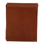A brown leather wallet or card holder with a textured grain, shown folded flat against a plain white background. 