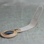 Handcrafted full-grain leather Airtag holder with loop and secure snap-button closure