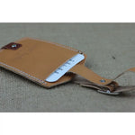 Tan leather luggage tag for travel, customizable leather luggage tag for style and convenience
