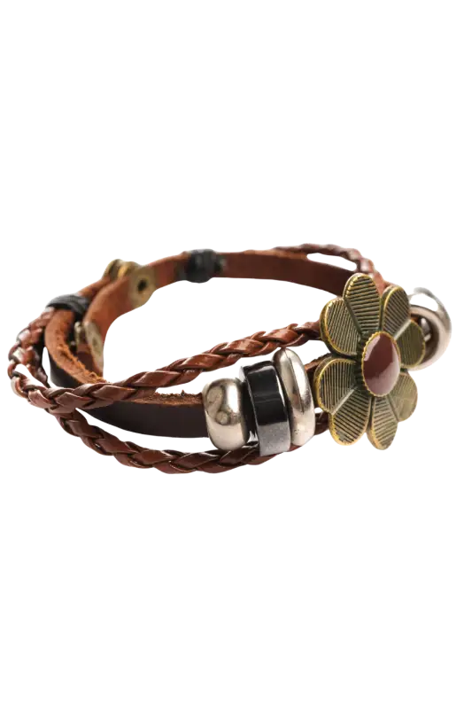 Brown leather bracelet with floral charm on a white background 