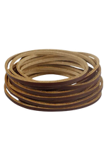 Coiled brown leather strap on a white background 