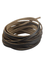 Coiled brown leather cord on a white background 