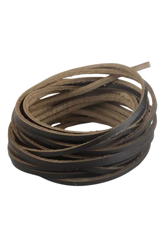 Coiled brown leather cord on a white background 