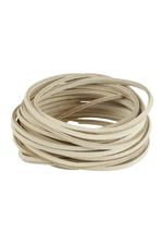 Coiled beige cord on a white background 