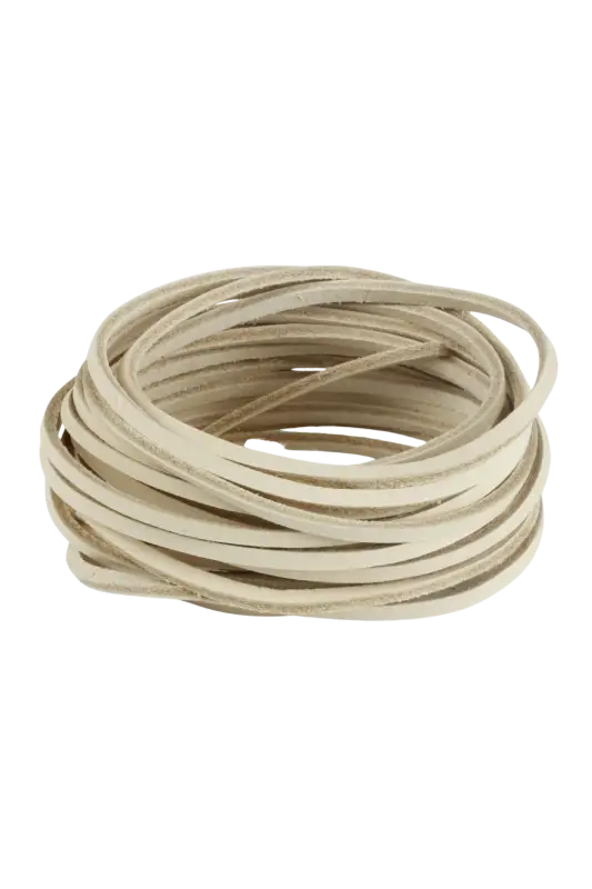 Coiled beige cord on a white background 