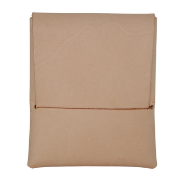 A minimalist, structured pouch or sleeve in a light tan or beige textured material, featuring a horizontal stitched detail across the middle, shown against a plain white background. #Natural