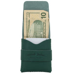 Green leather money clip with a $10 bill inside on a white background 