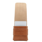 Brown leather case with a white interior on a white background 