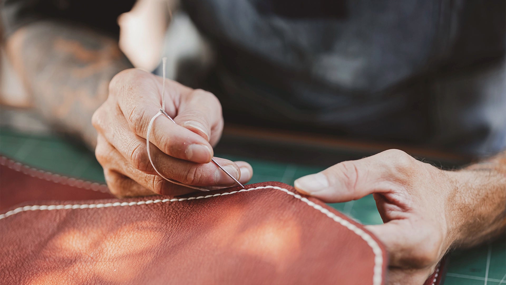 Hand stitching vs machine stitching leather comparison