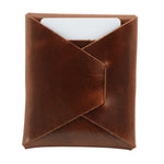 Brown leather card holder on a white background 