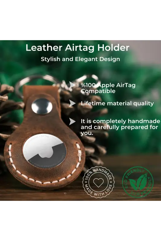 Leather Airtag Holder with Apple AirTag on a wooden surface, green blurred background 