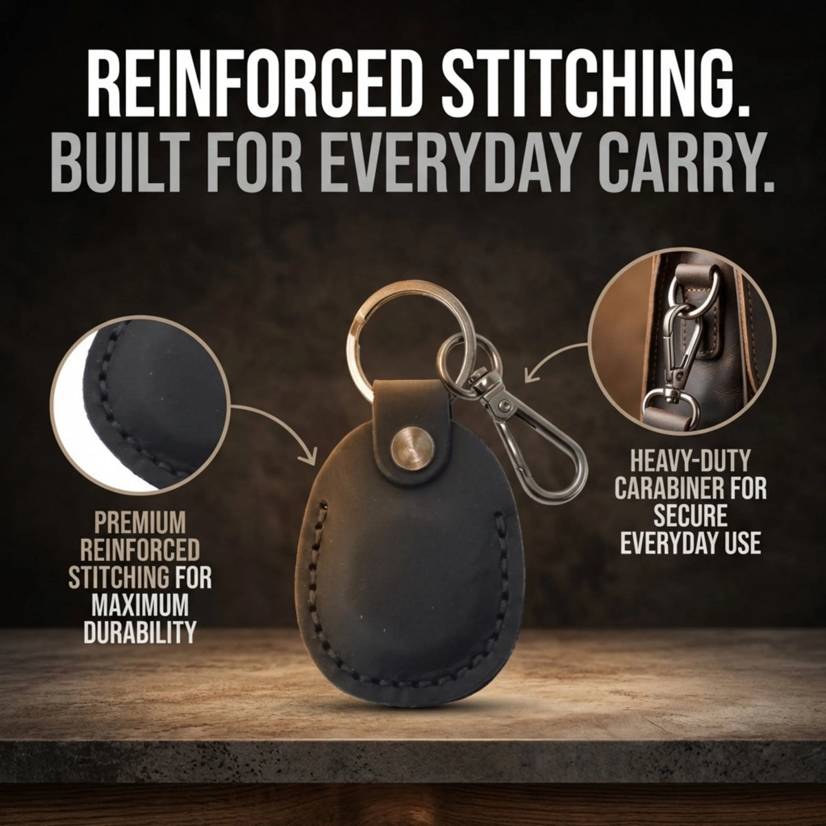 Black leather keychain with carabiner on a wooden surface, featuring reinforced stitching and heavy-duty carabiner text. 