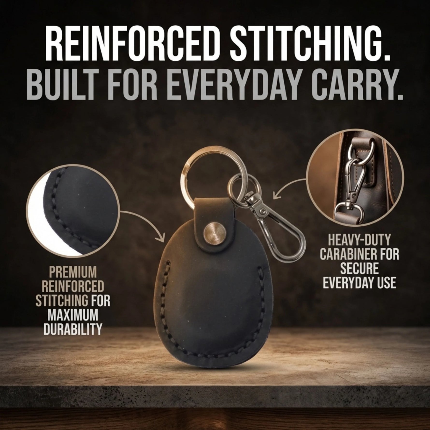 Black leather keychain with carabiner on a wooden surface, featuring reinforced stitching and heavy-duty carabiner text. 