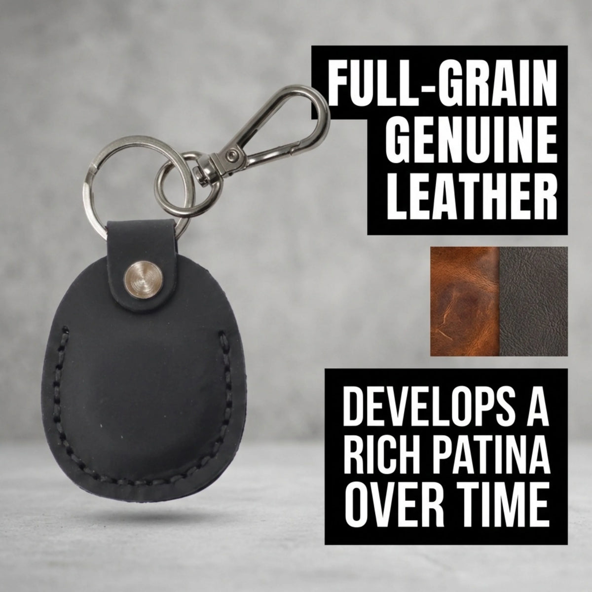 Black leather keychain with metal clip on a gray background, featuring text about full-grain leather and patina development. 