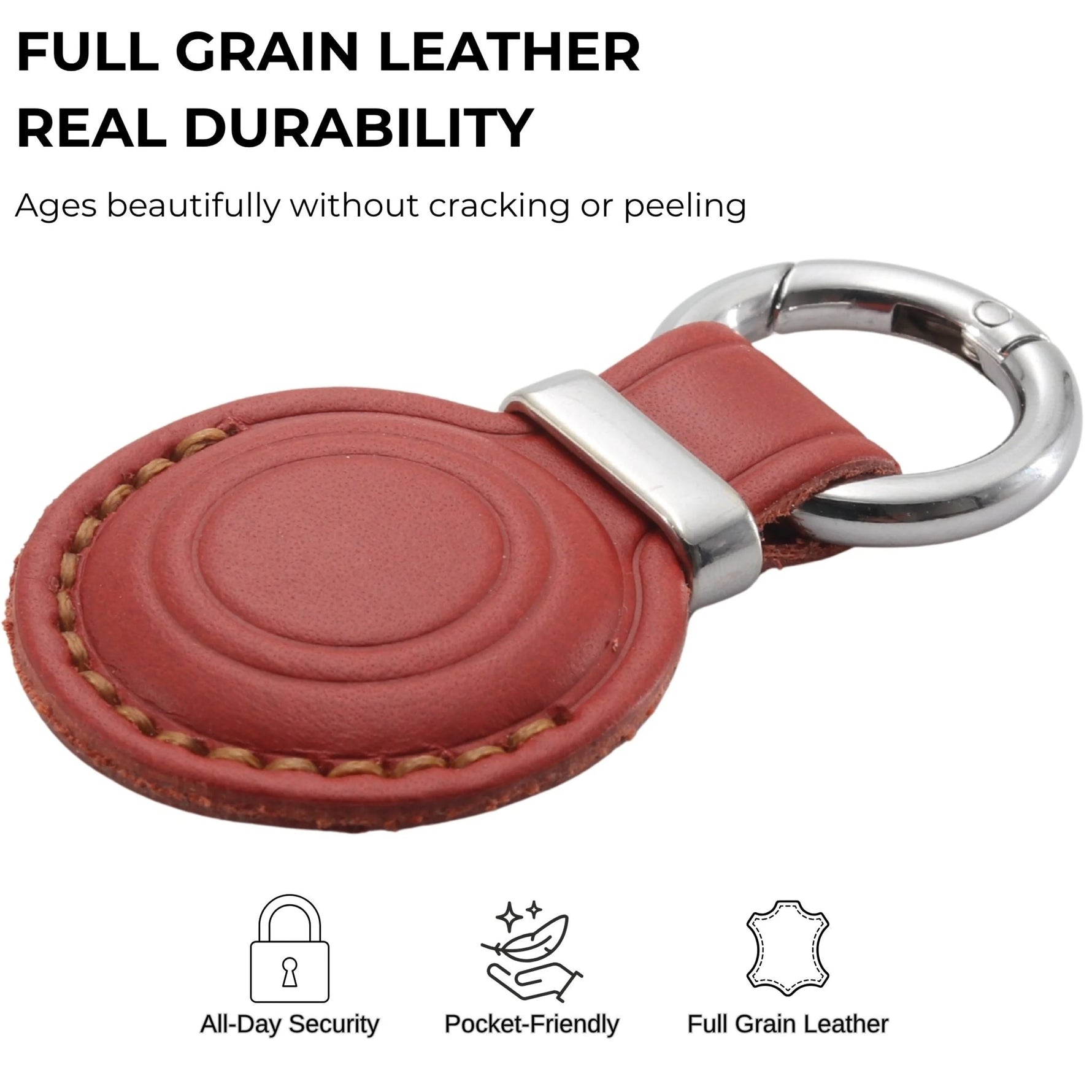 Red leather keychain with silver ring on a white background, highlighting full grain leather quality. 