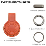 Orange leather AirTag holder with metal components on a white background 