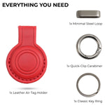 Red leather Air Tag holder with minimal steel loop, quick-clip carabiner, and key ring on a white background. 