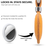 Close-up of a wooden keychain with a metal component, highlighting its secure fit. 
