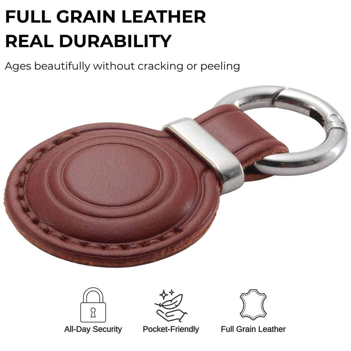 Brown leather keychain with silver ring on a white background, featuring text about full grain leather durability. 