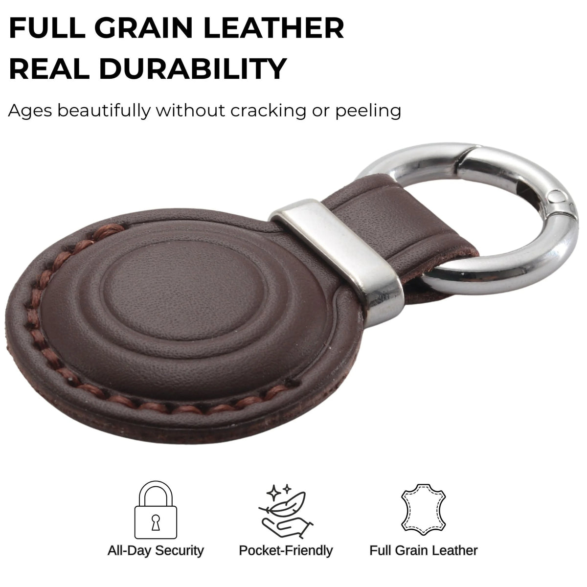 Brown leather keychain with silver ring on a white background, featuring text about full grain leather durability. 