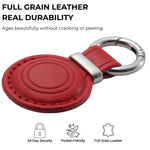 Red leather keychain with silver ring on a white background, highlighting durability and features. 