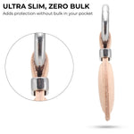 Ultra-thin metal clip with leather end on a white background, labeled 'Ultra Slim, Zero Bulk'. 