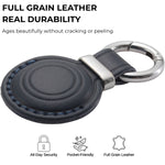 Black leather keychain with metal ring on a white background, highlighting durability and features. 