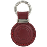 Red leather keychain with a silver ring on a white background 