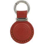Red leather keychain with a metal ring on a white background 