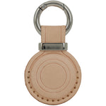Round beige leather keychain with metal ring on a white background 