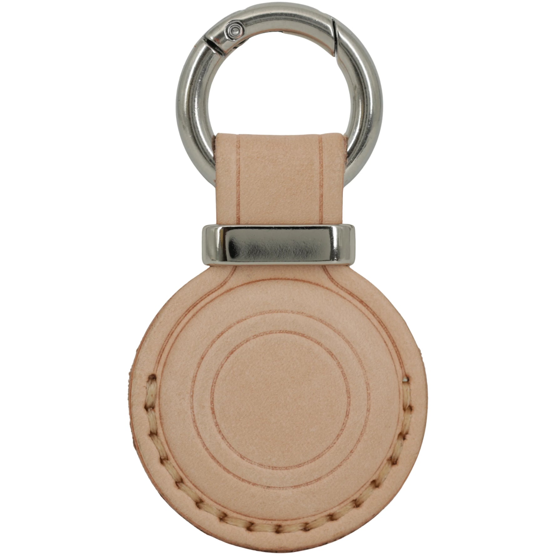 Round beige leather keychain with metal ring on a white background 