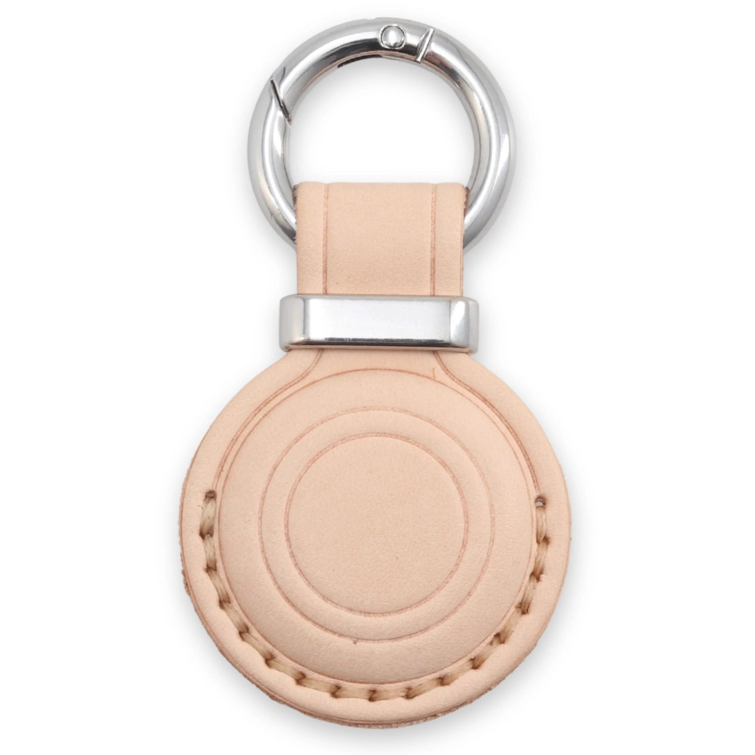 Beige leather keychain with silver ring on a white background 