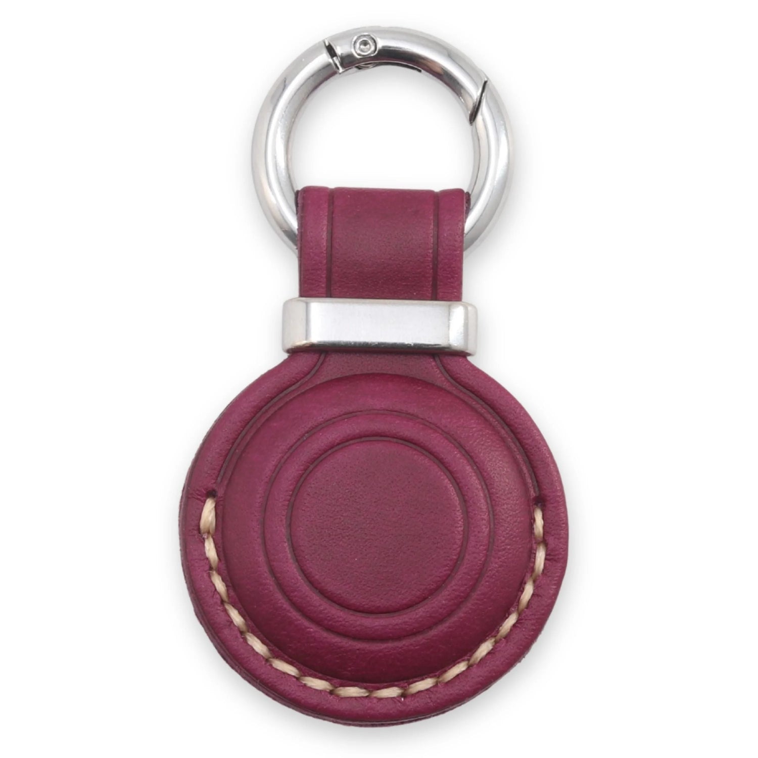 Purple leather keychain with silver ring on a white background 