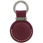 Maroon leather key fob with silver ring on a white background 