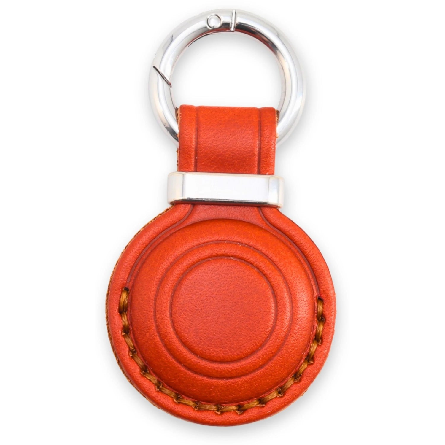 Red leather key fob with silver ring on a white background 