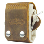 Brown leather sheath with white cord and metal clip on a white background 