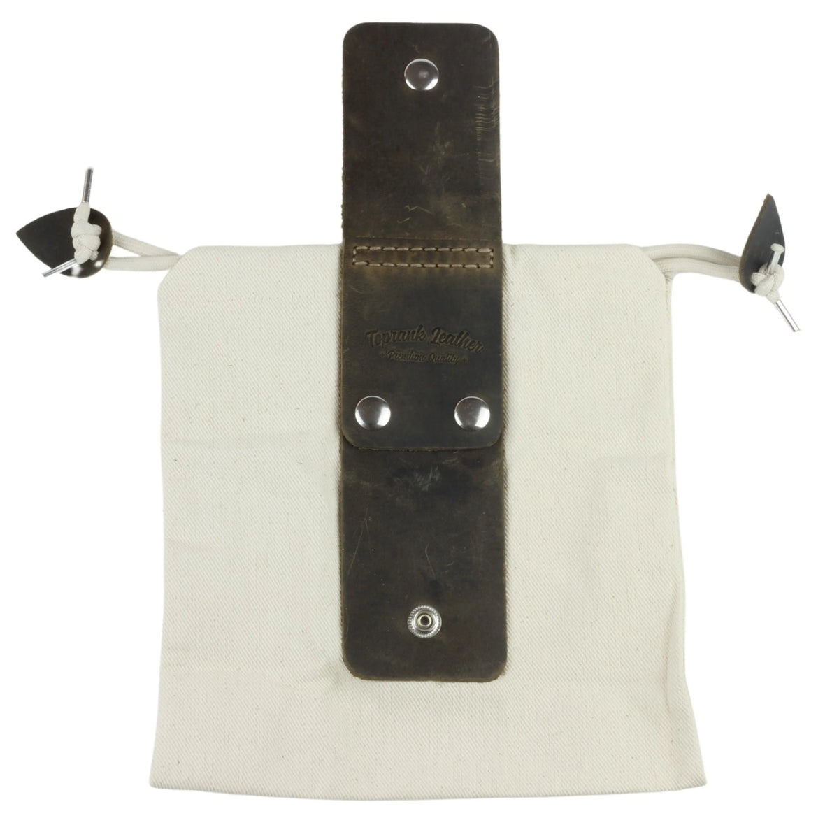 Canvas pouch with leather strap and metal grommets on a white background 