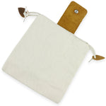 Beige pouch with a brown handle on a white background 