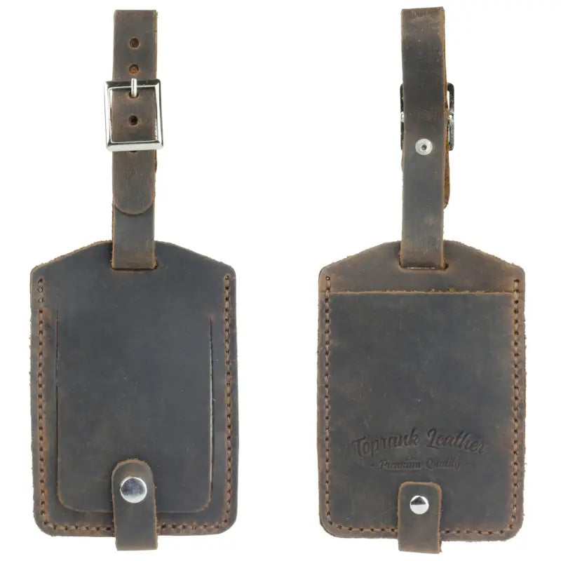 Two brown leather luggage tags made from full-grain leather luggage for secure bag identification 